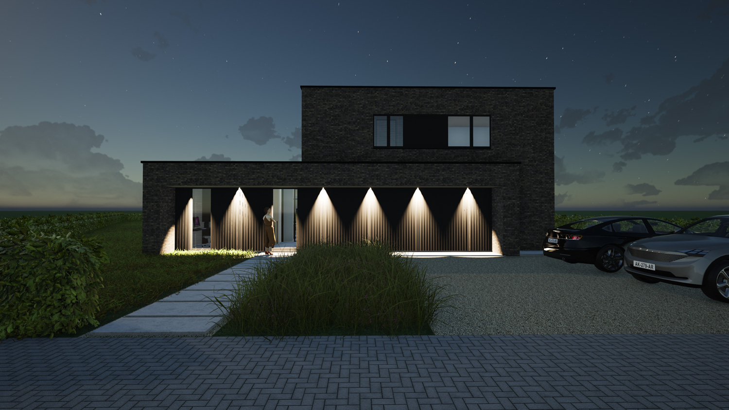 Voorgevel hedendaags-moderne villa 's nachts